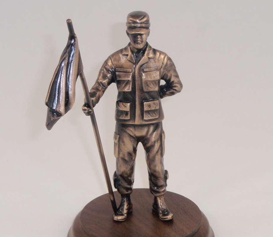 first sergeant statue with flag