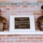 2 bronze portrait busts and plaque