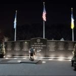 Bronze Call to Duty police officer kneeling memorial