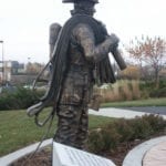 side view of firefighter statue
