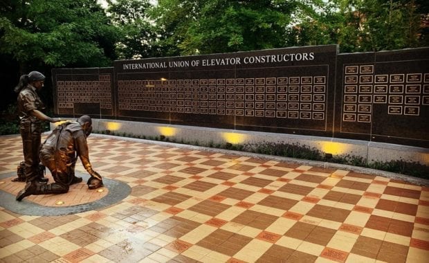 International Union of Elevator Constructors Memorial Male and Female Elevator Constructors statues with mother and children statues