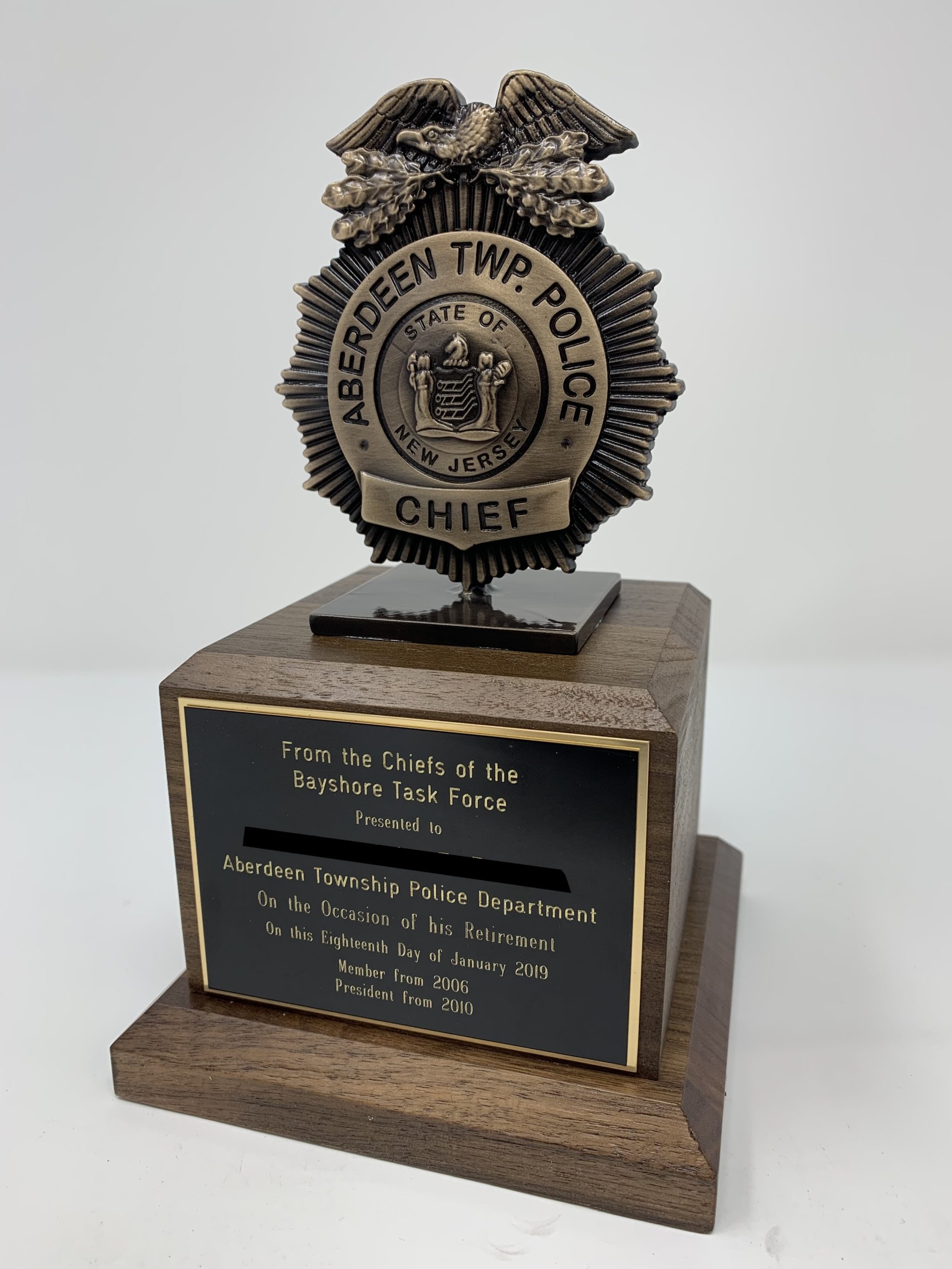 beautiful bronze award on pedestal