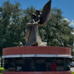 fallen law enforcment with angel on top of brick monument structure