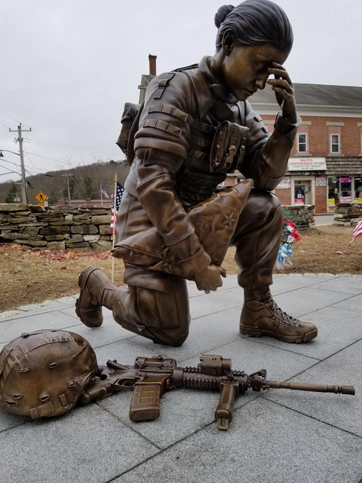 bronze kneeling female soldier statue