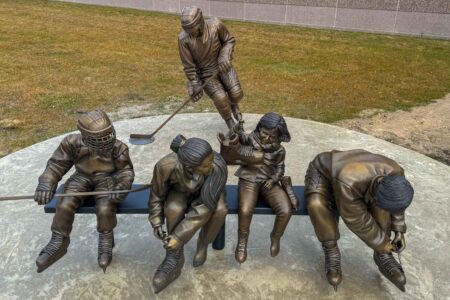 multiple bronze hockey statues