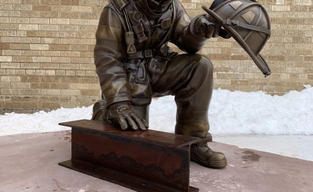 Bronze firefighter statue