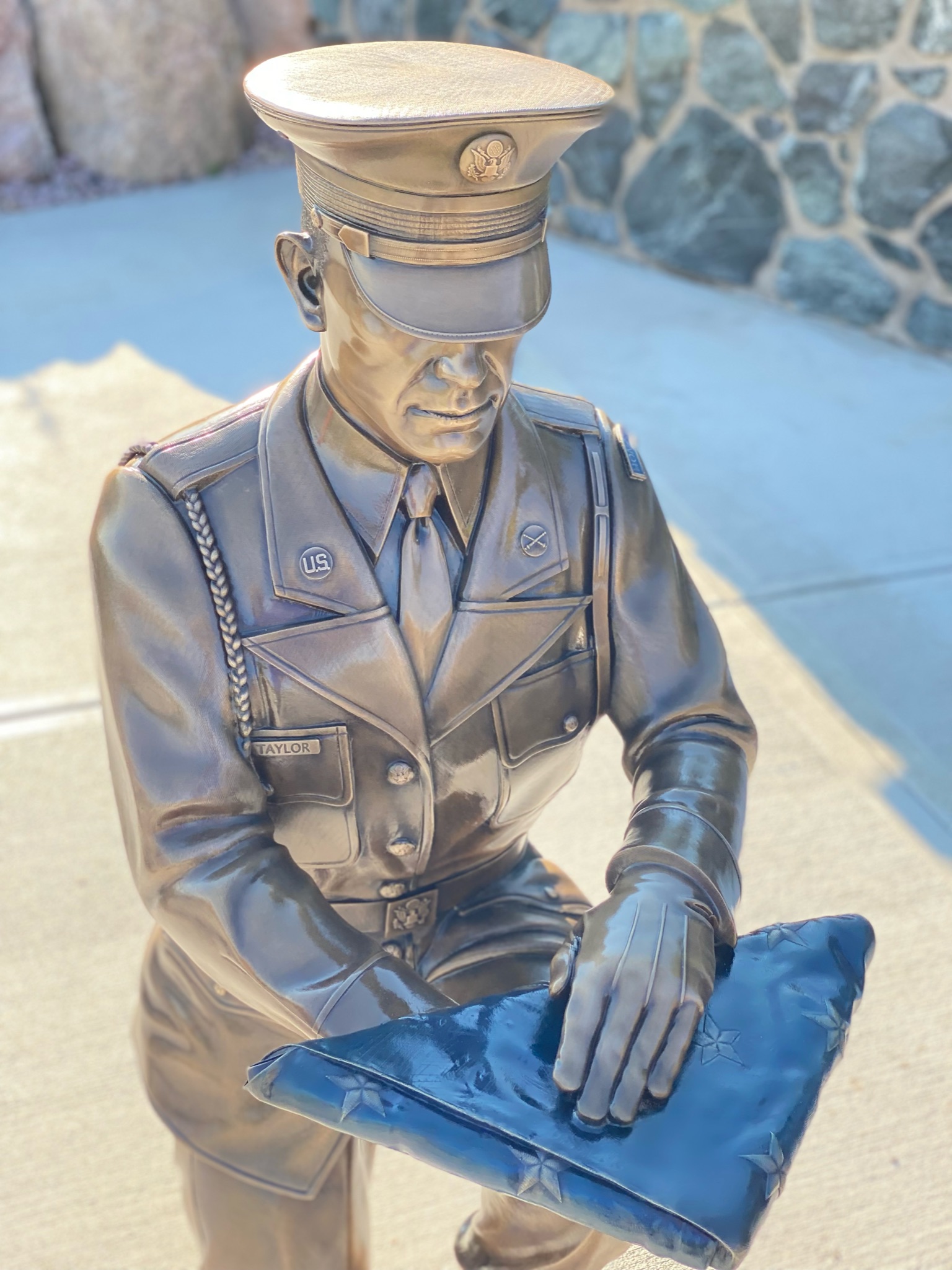 closeup of bronze honor guard statue