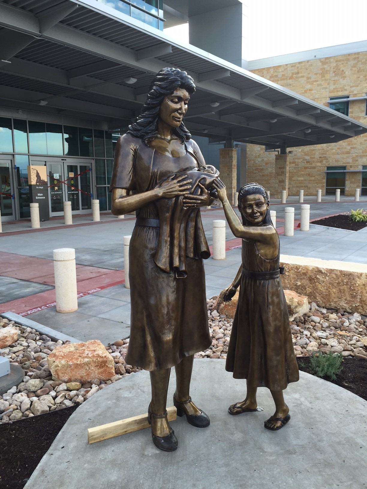 bronze family statues