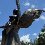 bronze angel holding law enforcement