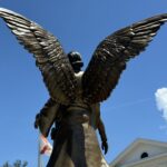 bronze angel wings statue