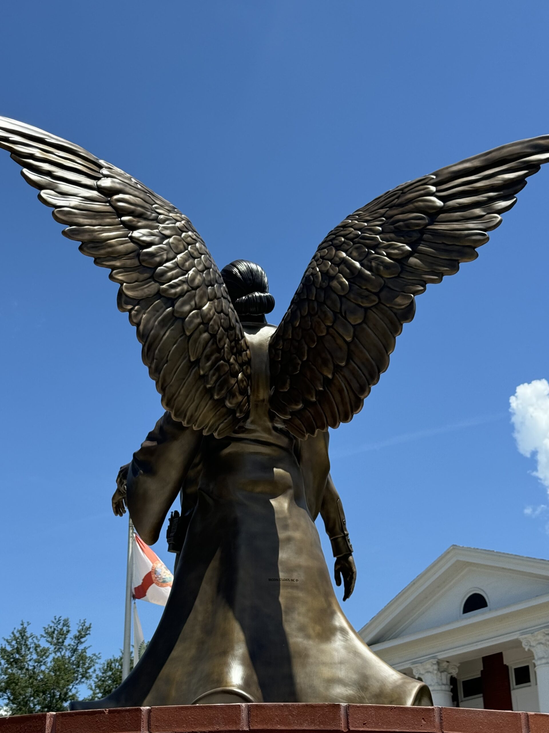 bronze angel wings statue