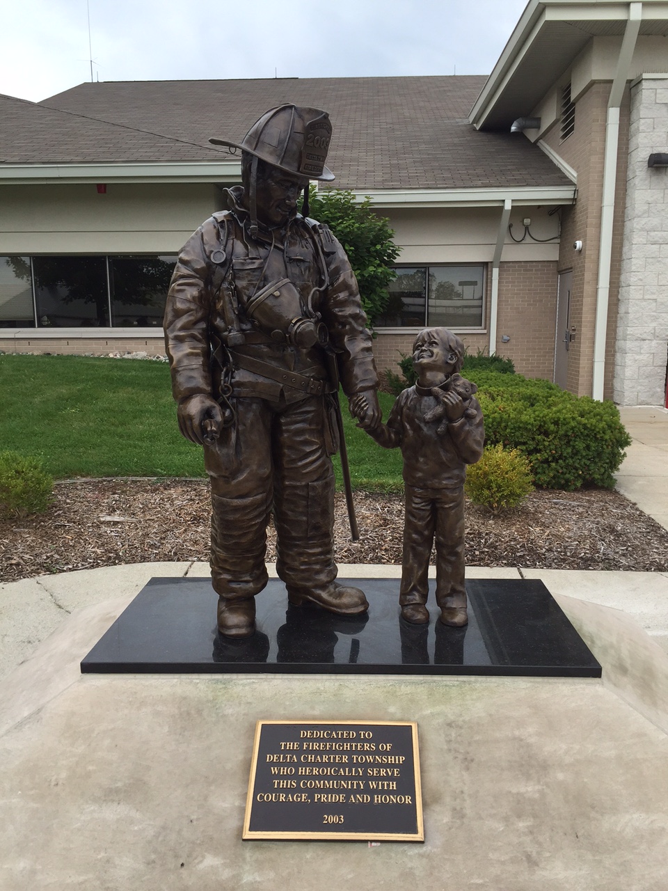 firefighter memorial with plaque