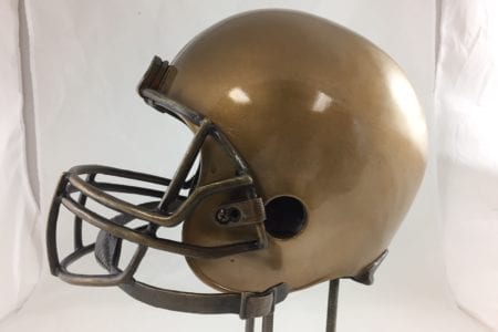 custom made bronze sculpture of a football helmet