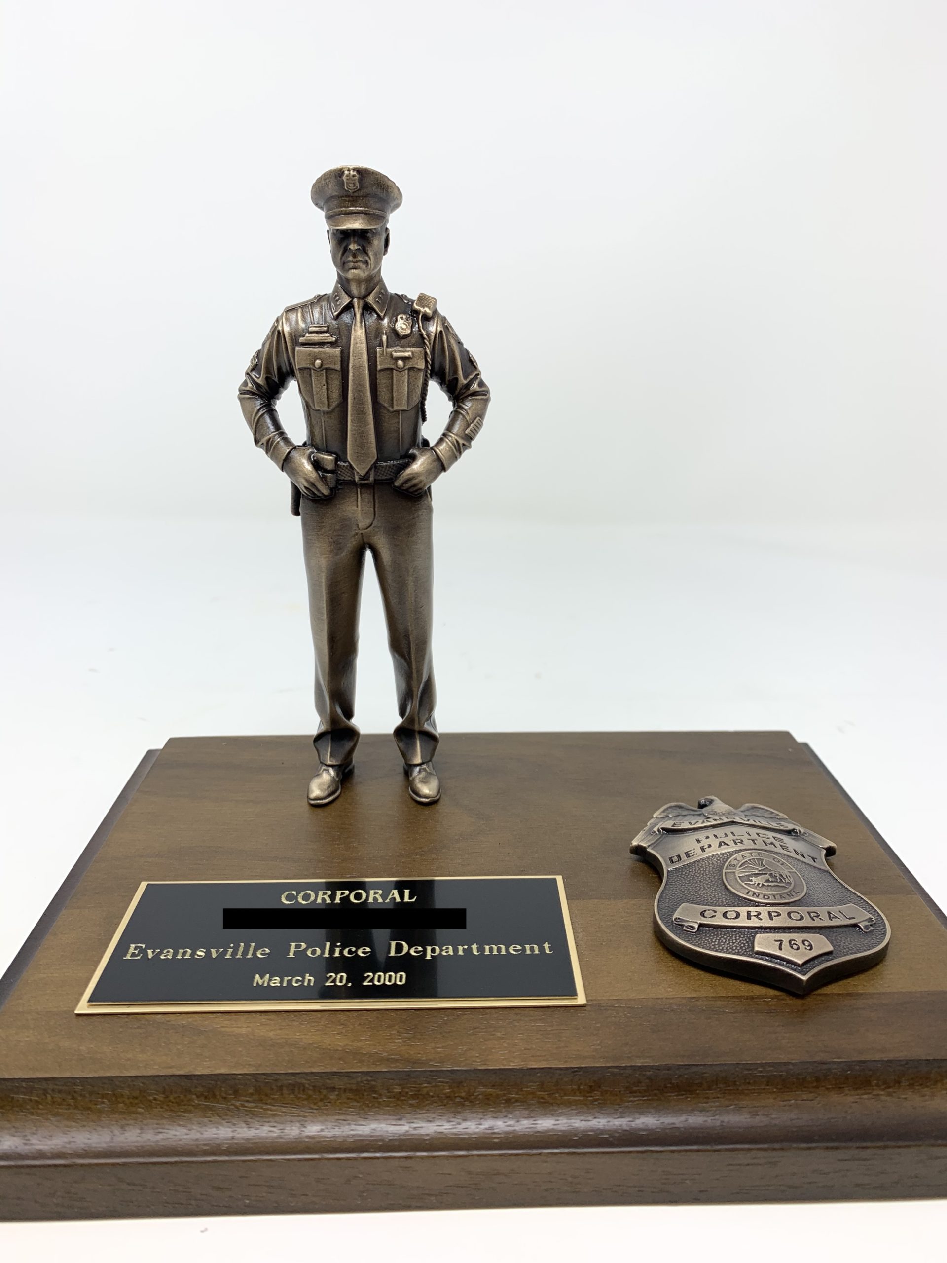 mini bronze police figurine