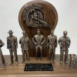 multiple bronze police figurines