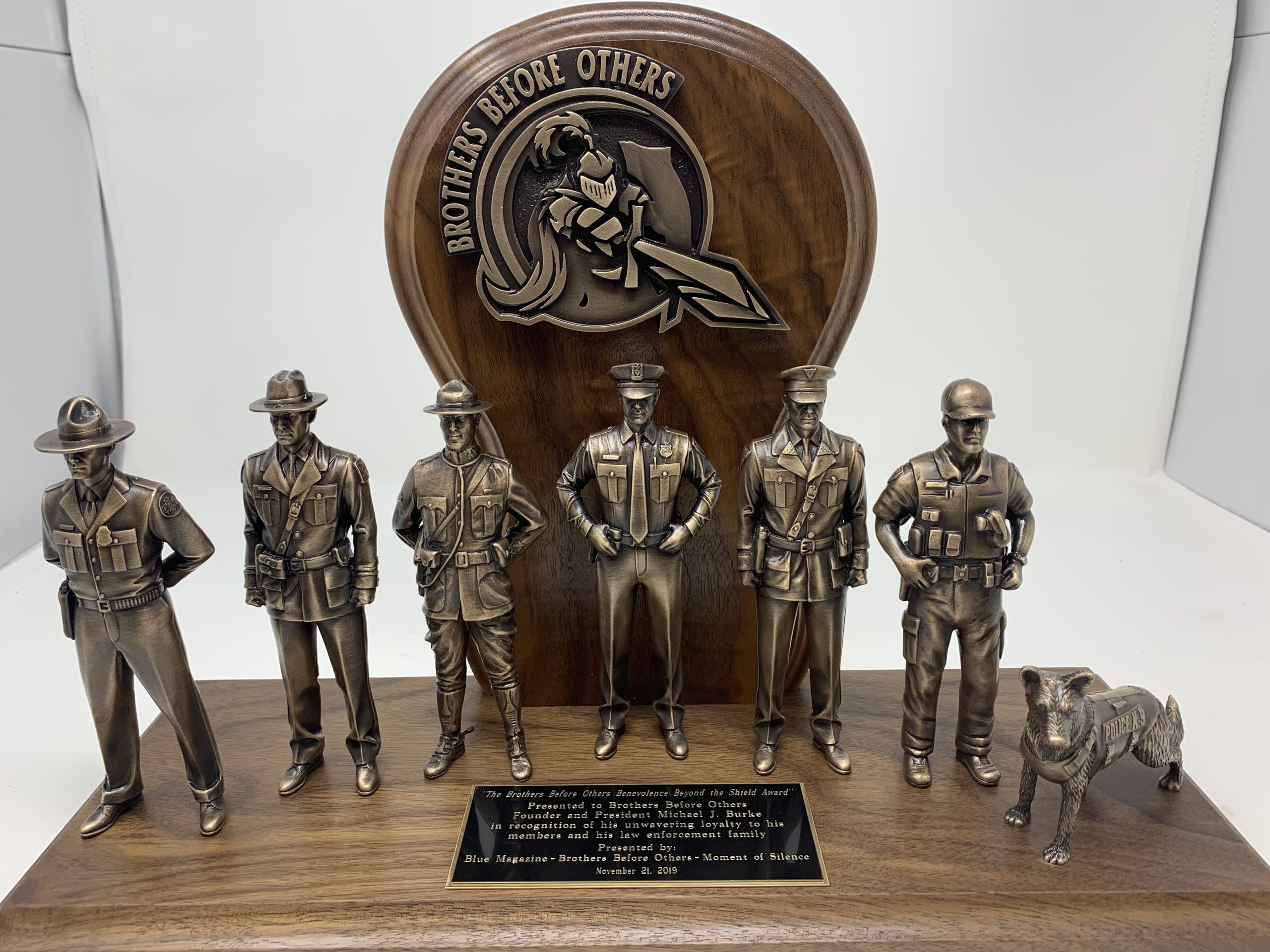 multiple bronze police figurines