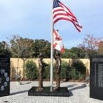 Bronze law enforcement honor guard statue memorial.