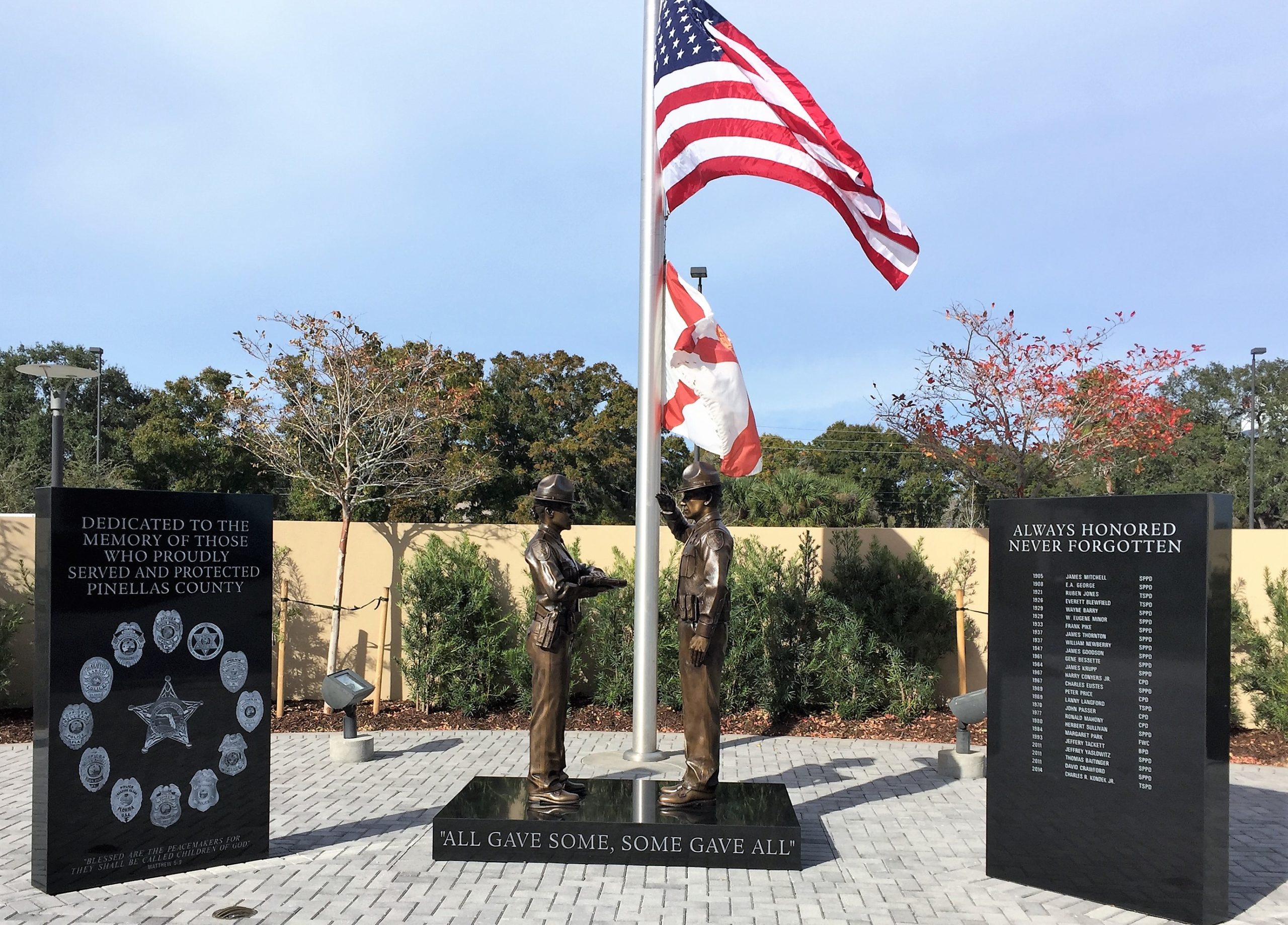 Bronze law enforcement honor guard statue memorial.