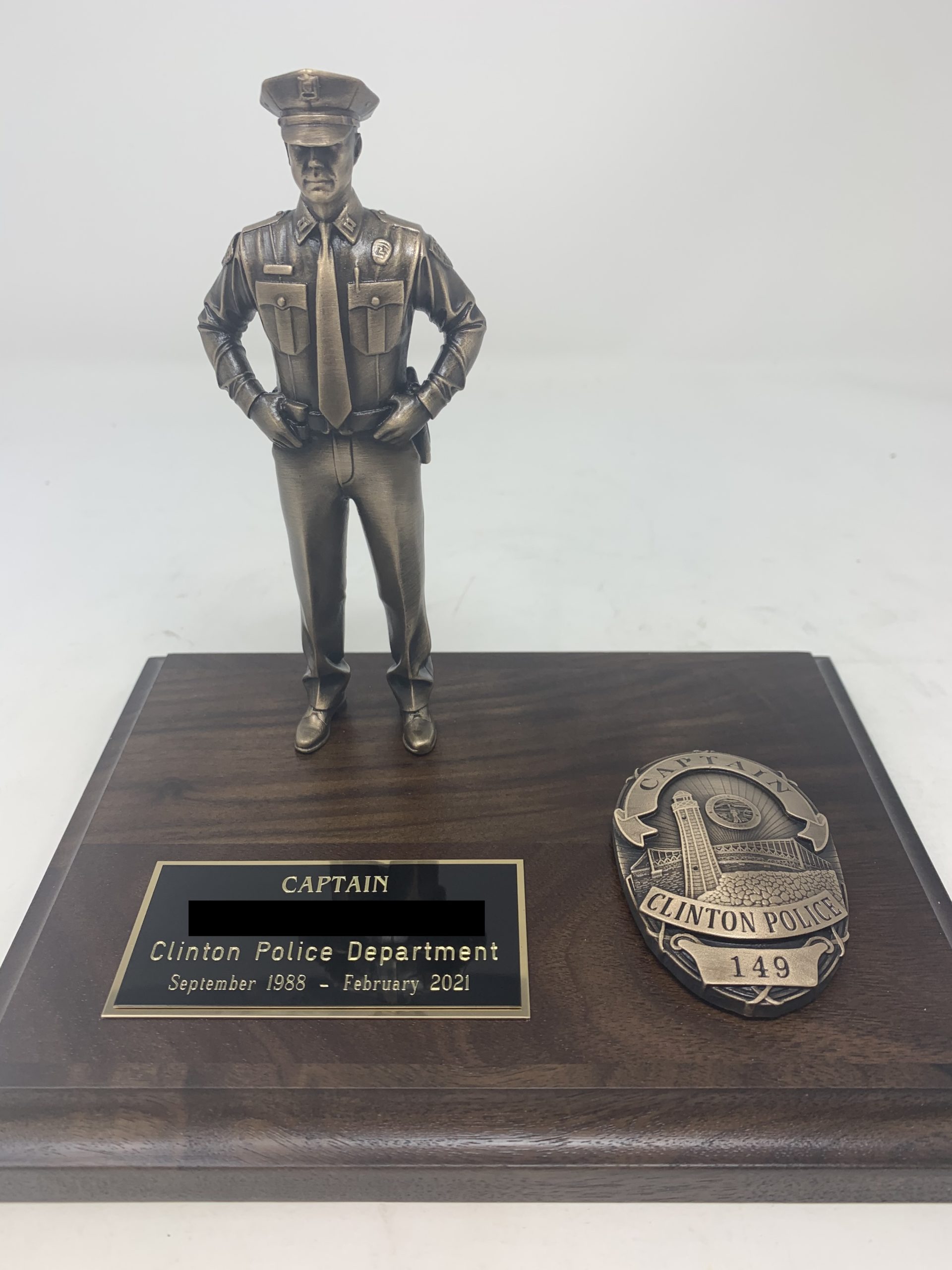 custom police figurine on a plaque