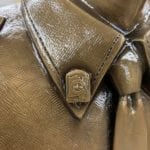 collar of police officer bronze statue