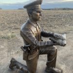 kneeling outdoor police officer statue