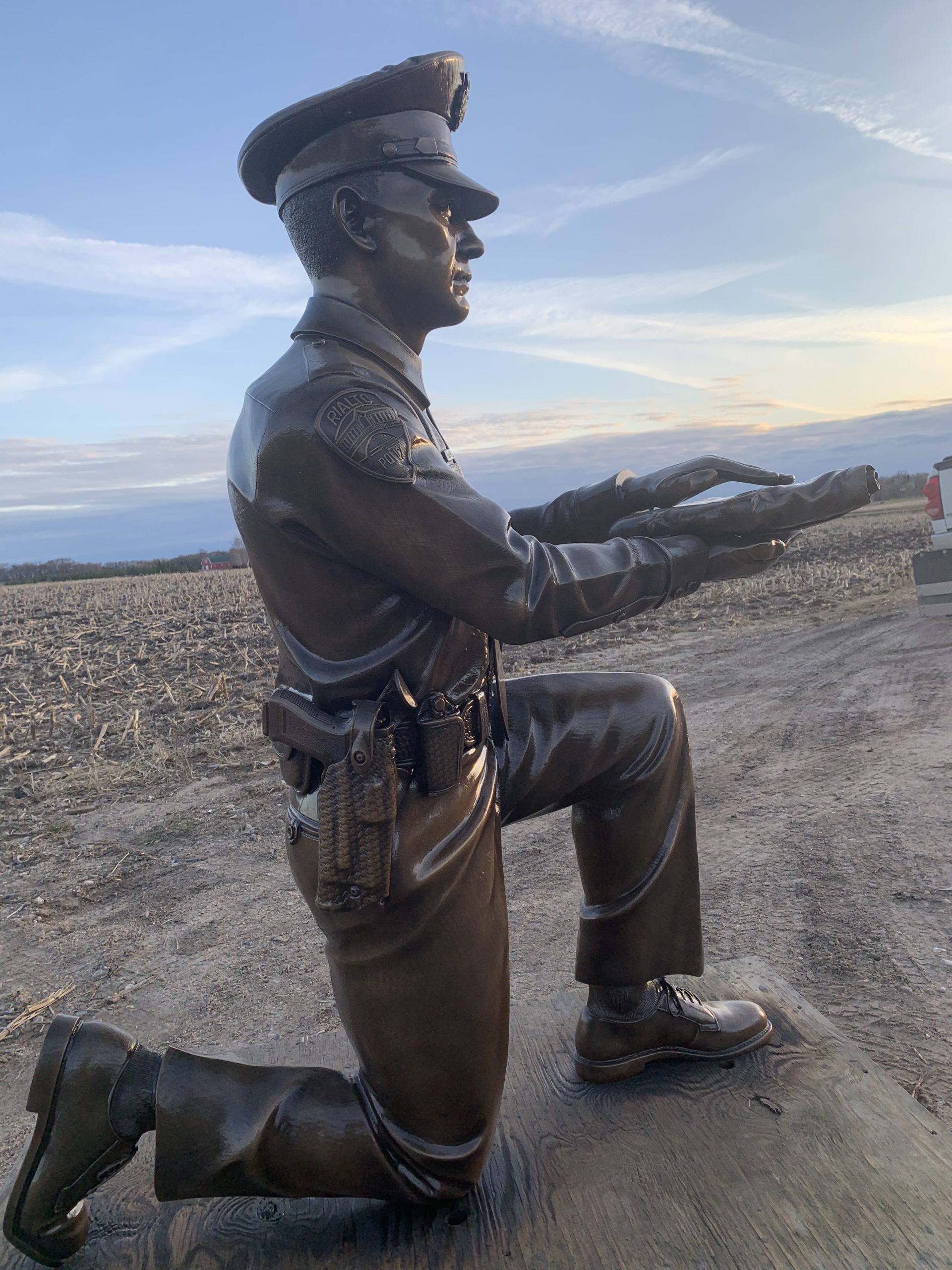 kneeling outdoor police statue