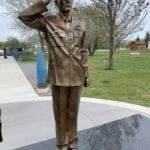 life size soldier statue saluting in uniform