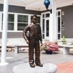 Bronze police officer in uniform statue