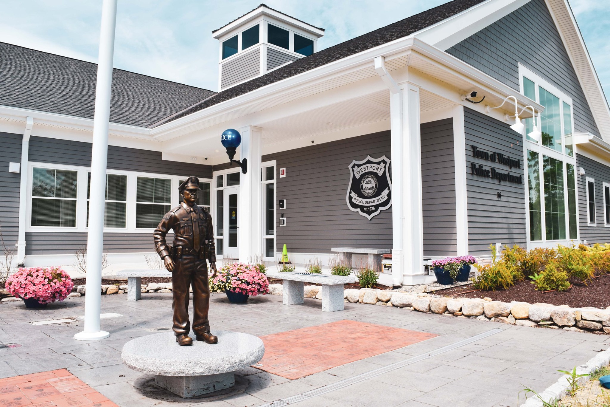 police officer bronze statue displayed outdoors