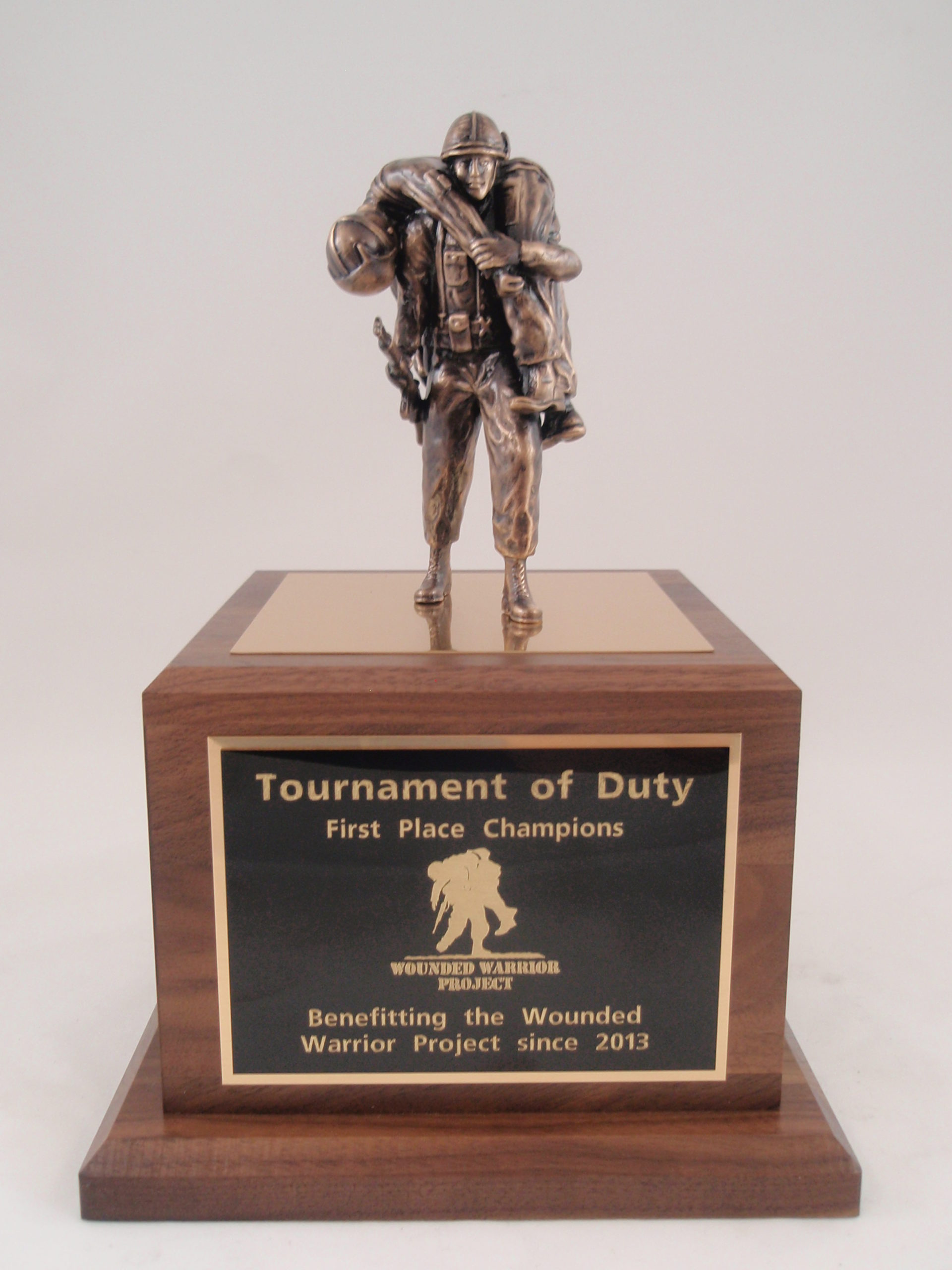 wounded warrior statue with bronze plate
