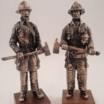 multiple mini firefighter statues