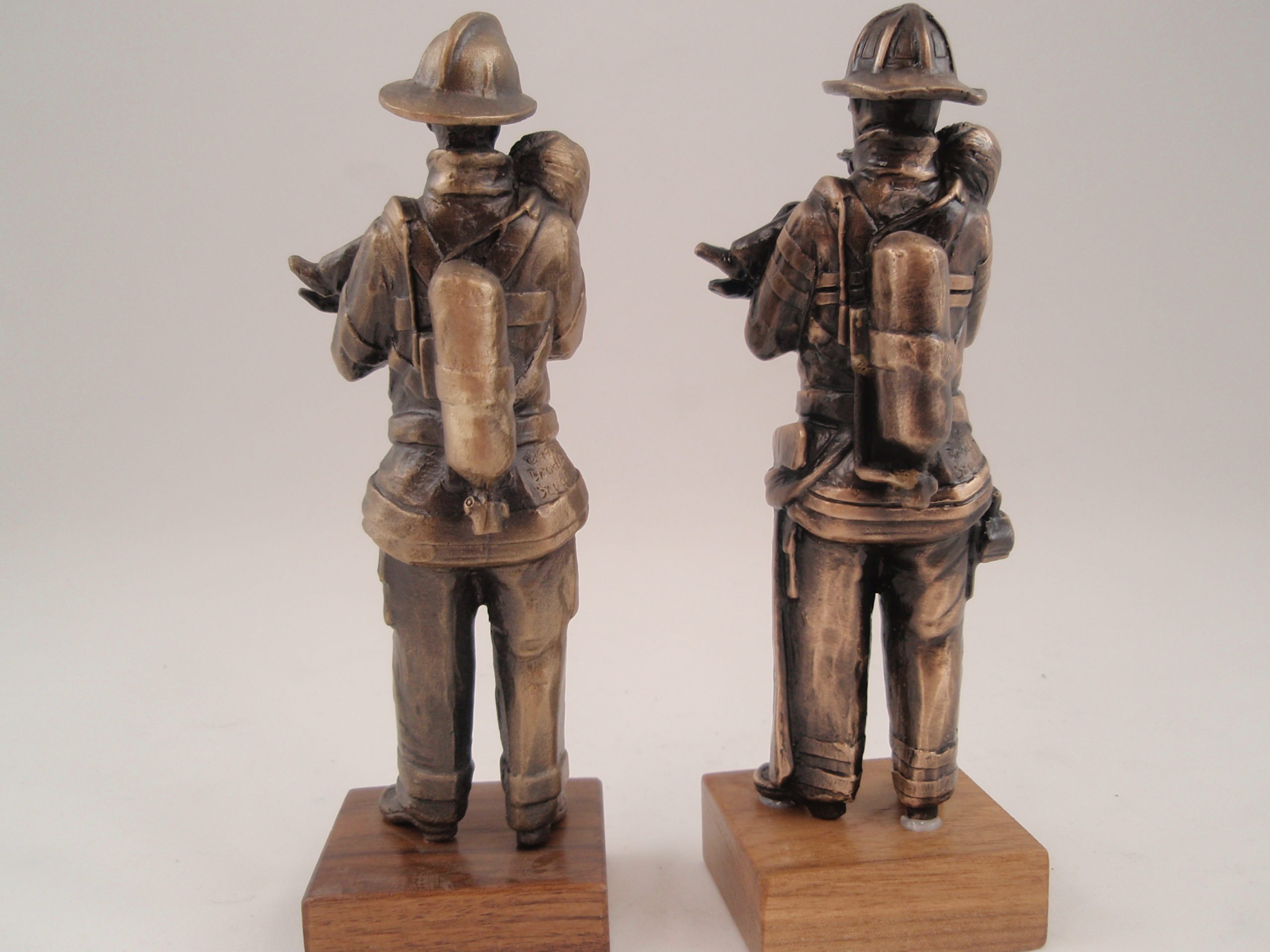 two miniature bronze sculptures