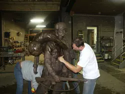 The bronze piece is then welded, polished, sandblasted, treated for desired patina, and waxed for protection.