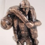 closeup of wounded warrior statue