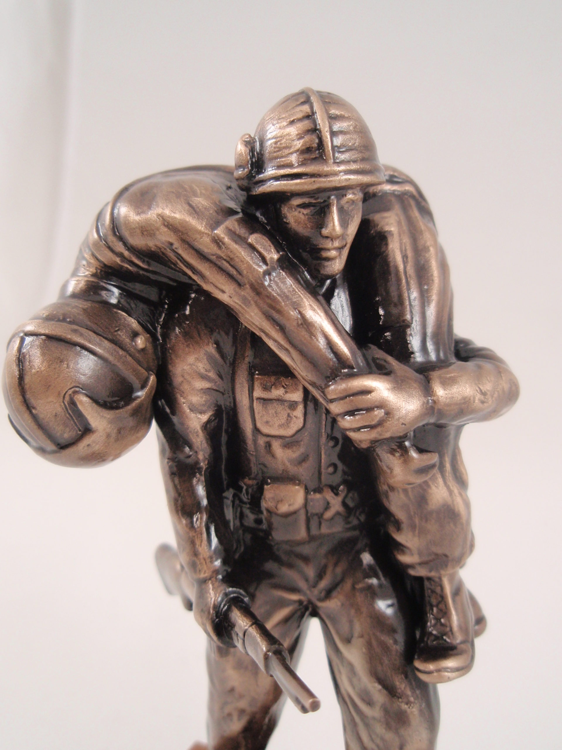 closeup of wounded warrior statue